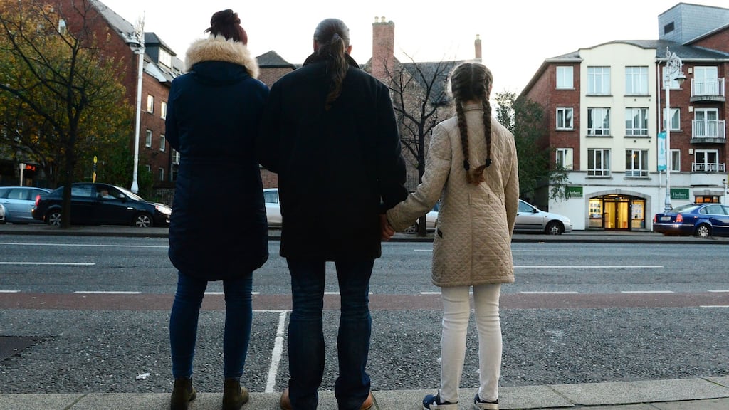Jacinta and Chloe  with their Dad. Photograph: Cyril Byrne/The Irish Times