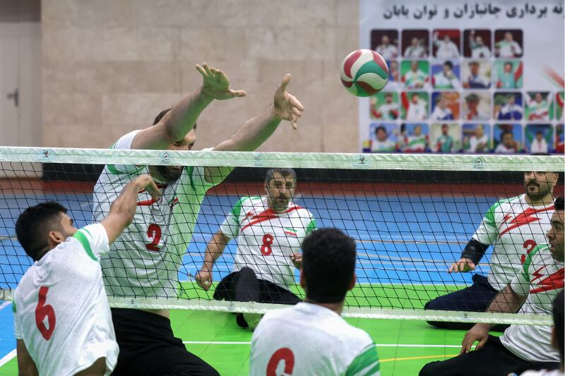 Morteza Mehrzad during a training session for Iran's national sitting volleyball team. He has helped the team to the Paralympic final in Paris. Photograph: Atta Kenare/AFP/Getty Images