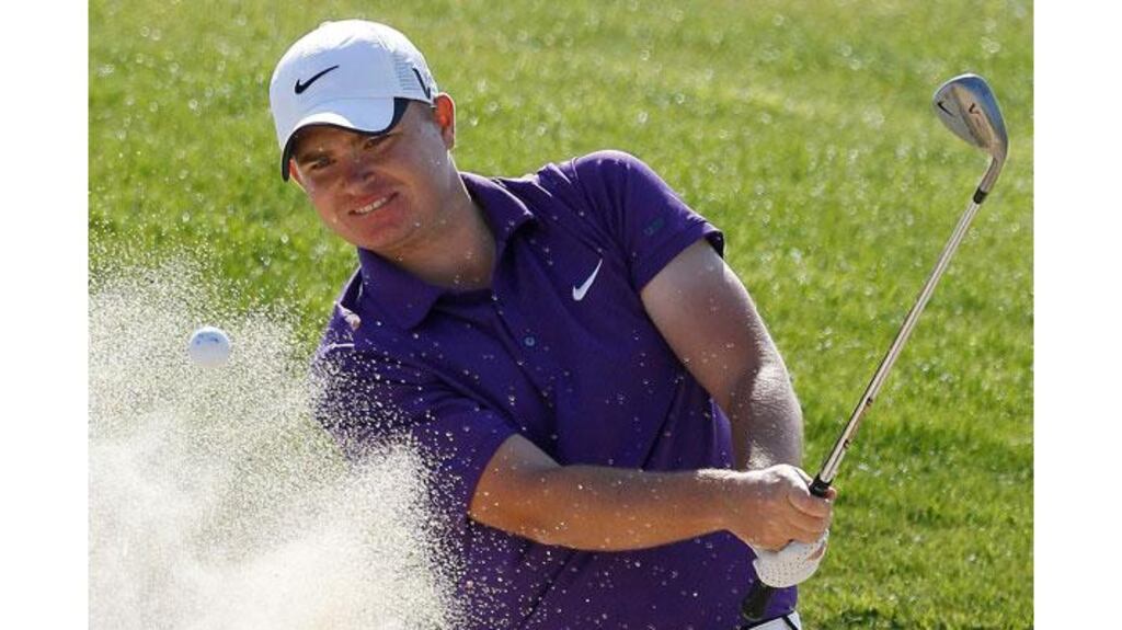 James Morrison of England hits a ball out off the bunker from the third hole during the French Open at the Golf National near Paris. Photograph: Regis Duvignau/Reuters