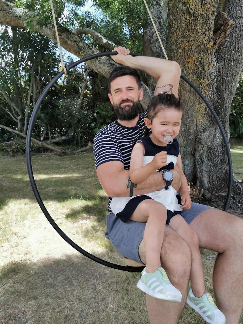 James Keegan with his daughter in New Zealand.