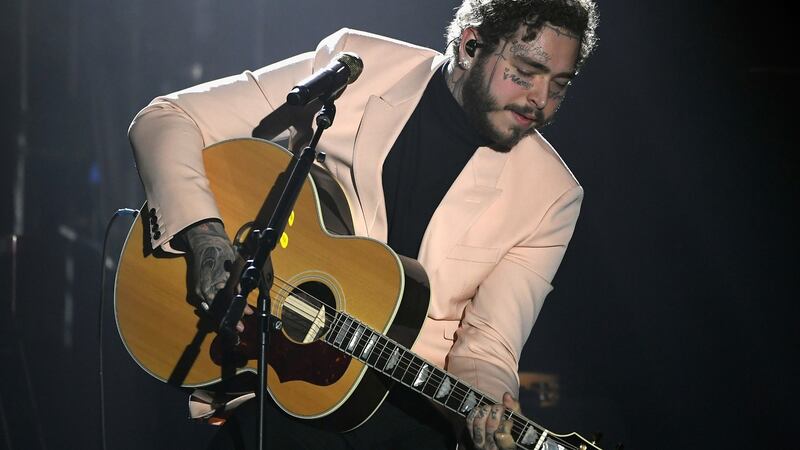 Post Malone promises an online party to end ‘em all to celebrate the 25th birthday of Pokemon. Photograph: Timothy Norris/Getty