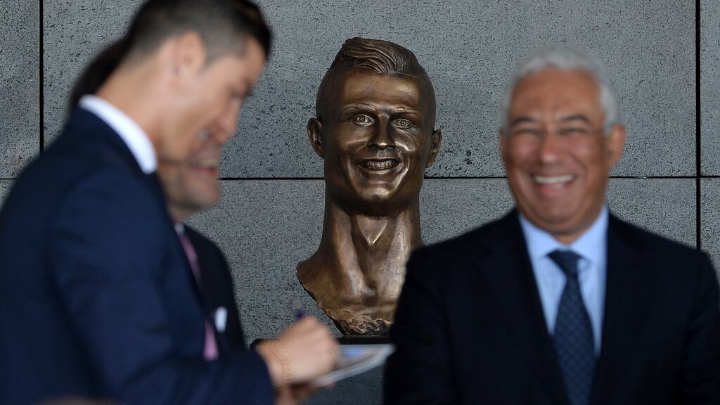 Cristiano Ronaldo attends the unveiling of a bust in his honour at the ceremony at Madeira Airport to rename it Cristiano Ronaldo Airport. Photograph: Octavio Passos/Getty Images