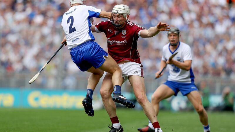 Joe Canning stops Shane Fives as he attempts to go past. Photo: Tommy Dickson/Inpho