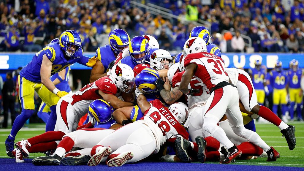 Matthew Stafford scores a touchdown during the LA Rams’ win over the Arizona Cardinals. Photograph: Ronald Martinez/Getty