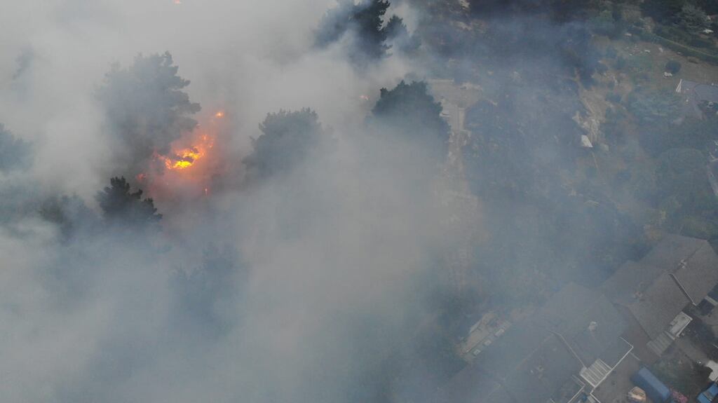 The fire was quenched by midday on Tuesday but firefighters remained on the scene to watch for flare ups. Photograph: Dublin Fire Brigade/Twitter