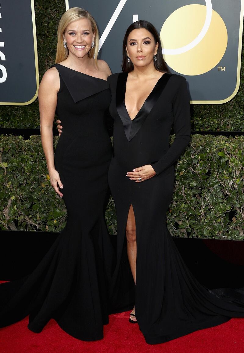 Reese Witherspoon and Eva Longoria at the 75th Annual Golden Globe Awards. Photograph: Frederick M Brown/Getty Images