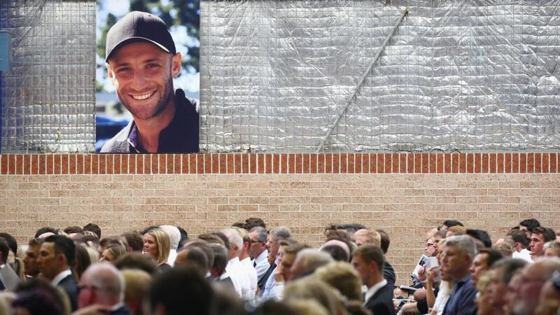Guests at the funeral service for Phillip Hughes at Macksville High School Stadium in Macksville, Australia. The Australian cricketer passed away, aged 25, as a result of head injuries sustained during the Sheffield Shield match between South Australia and New South Wales at the SCG on November 25th. Photograph: Cameron Spencer - Pool/Getty Images