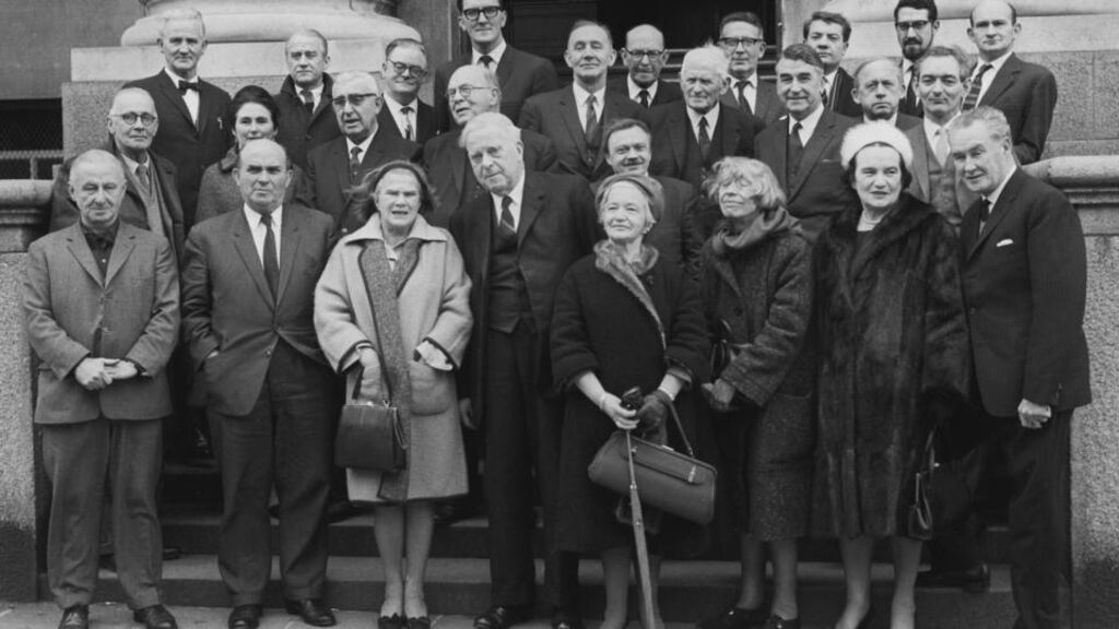 Brian Friel is pictured, middle row, extreme right, at the first meeting of Abbey Theatre shareholders on February 23rd, 1965 outside Government Buildings. Photograph: Jack McManus