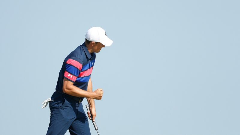 Jordan Spieth celebrates making a birdie putt on the 10th. Photo: Oisin Keniry/Getty Images