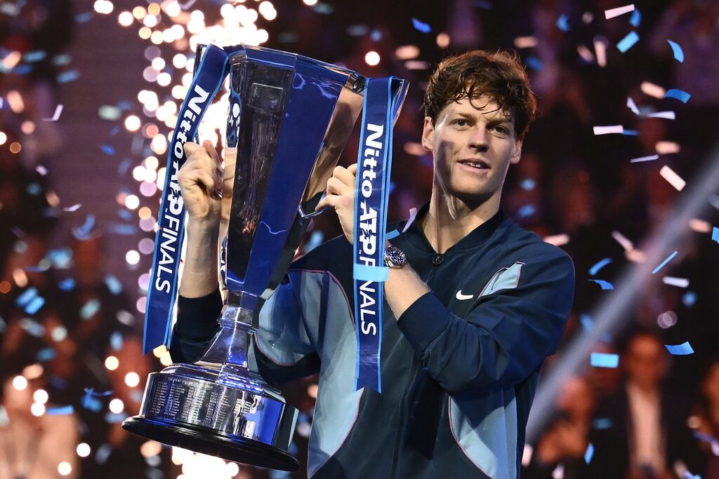 Italy's Jannik Sinner lifts the trophy after winning the final against USA's Taylor Fritz at the ATP Finals in Turin. Photograph: Marco Bertorello/AFP via Getty Images