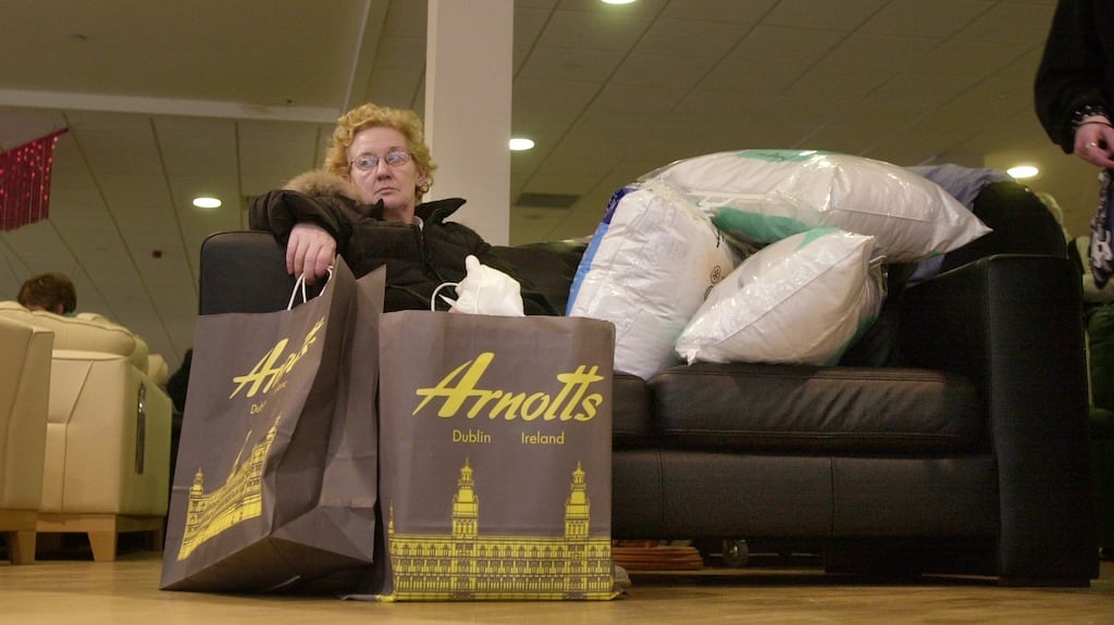 Break time: A shopper off her feet in the furniture department. Photograph: The Irish Times