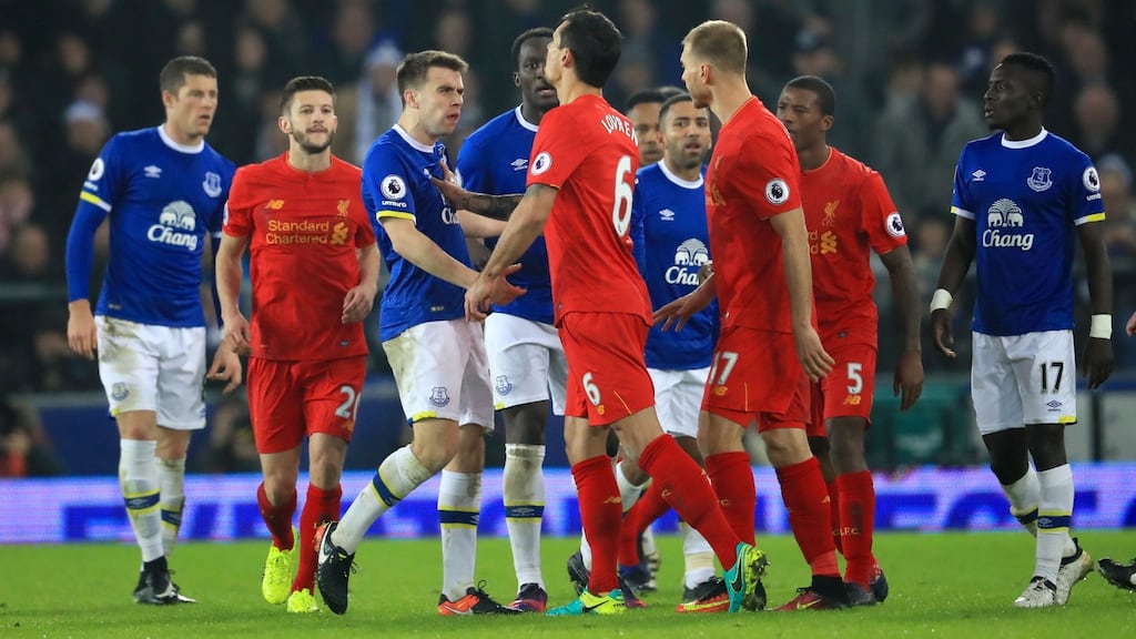 Everton’s Seamus Coleman and Liverpool’s Dejan Lovren have a disagreement during the Premier League match at Goodison Park. Photo: Mike Egerton/PA