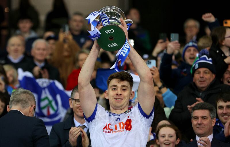 Monaghan’s Micheal Bannigan lifts the trophy after beating Roscommon in the NFL Division 2 final. Photograph: Ryan Byrne/Inpho