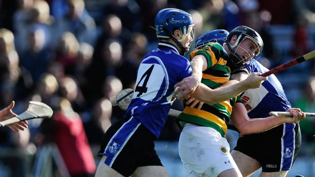 Glen Rovers’ David Cunningham is tackled by Conor O’Sullivan and William Kearney of Sarsfields during the Cork senior hurling final at Páirc Uí Chaoimh. Photo: Tommy Grealy/Inpho