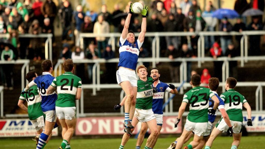 St Vincents midfielder Eamon Fennell claims a high ball against Portlaoise in yesterday’s provincial quarter-final clash. Photograph: James Crombie/inpho