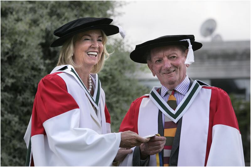 Hilary Weston receiving an honorary doctorate from University College Dublin alongside playwright Brian Friel. Photograph: Dara Mac Dónaill / The Irish Times