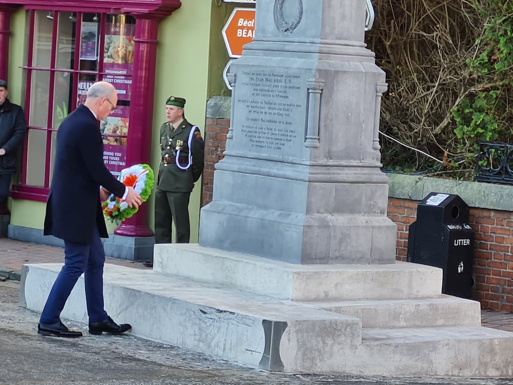 Simon Coveney lays a wreath at the monument to Seán Hales in Bandon to mark the centenary of his assassination. Photograph: Barry Roche
