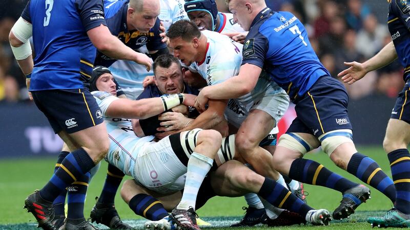 Cian Healy is enveloped by the Racing defence. Photograph: Billy Stickland/Inpho