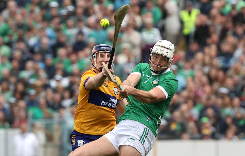 Clare's David Fitzgerald and Kyle Hayes of Limerick. Photograph: Bryan Keane/Inpho