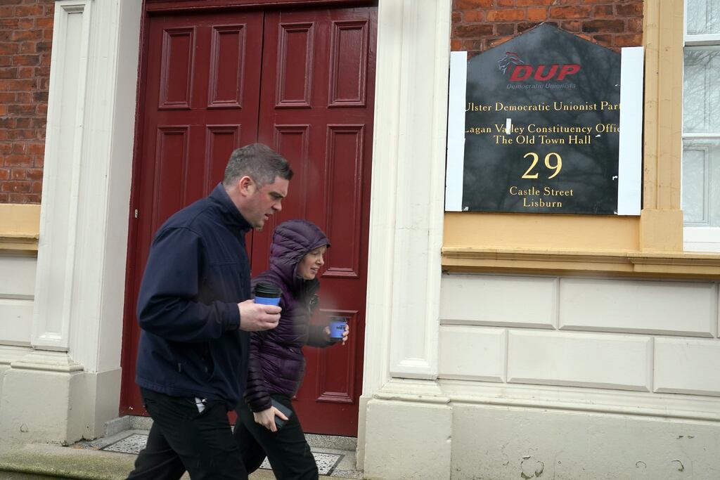 DUP and UUP representatives are often asked on the doorsteps about the possibility of a merger. They can hardly explain why this is unrealistic. Photograph: Brian Lawless/PA Wire