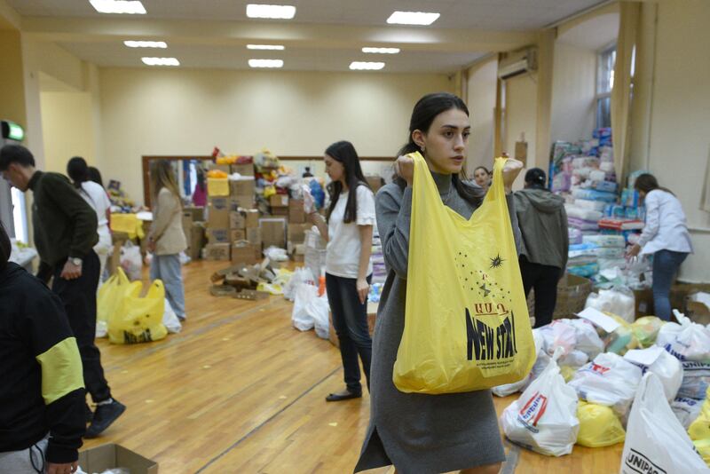 Volunteers organise aid packages in Yerevan for refugees from Nagorno-Karabakh settled in different parts of Armenia. Photograph: Karen Minasyan/AFP