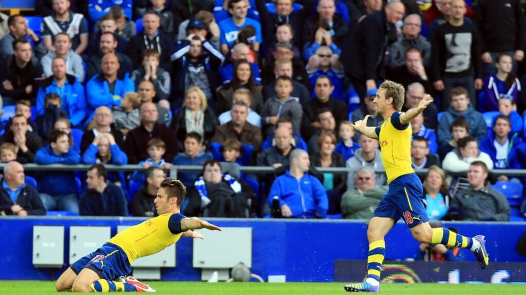 Arsenal’s Olivier Giroud celebrates his late equaliser against Everton at Goodison Park. Photograph: Peter Byrne/PA Wire