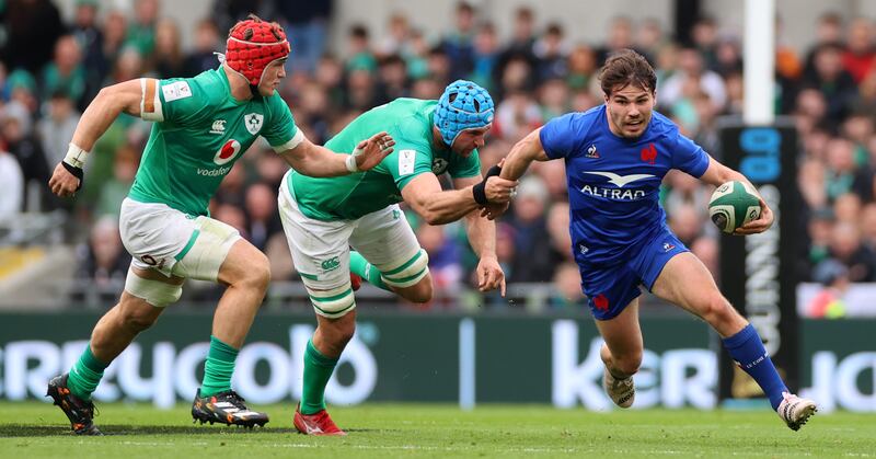 Ryan and van der Flier track down Antoine Dupont during the 2023 Six Nations. Photograph: James Crombie/Inpho