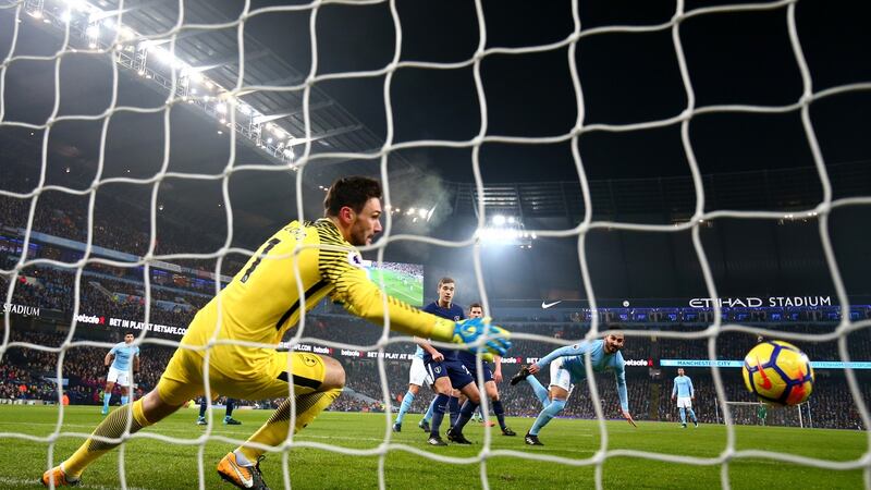 Ilkay Gundogan scores Manchester City’s opener against Spurs. Photograph: Clive Brunskill/Getty