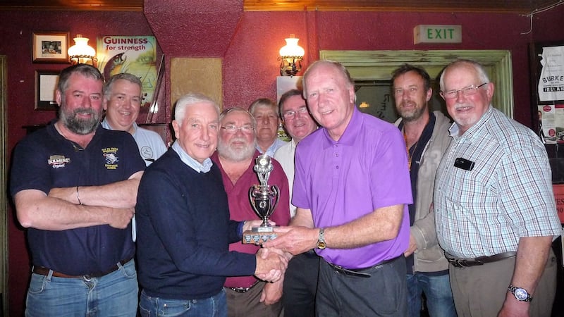 Former Liverpool FC manager, Roy Evans presenting the Galway Challenge Angling Cup to winner Derek Evans at end-of-season competition on Lough Mask, in Burkes of Clonbur.