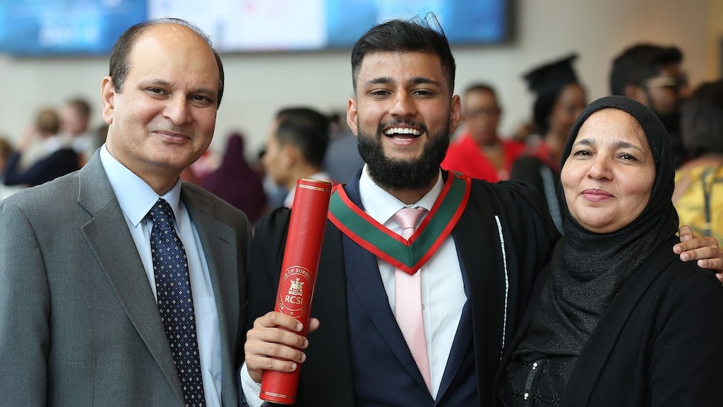 Mohammad Ahmed Rasheed from Sligo with parents Dr Khalid Rasheed and Dr Sadia Anis after graduating from the RCSI. Photograph: Julien Behal