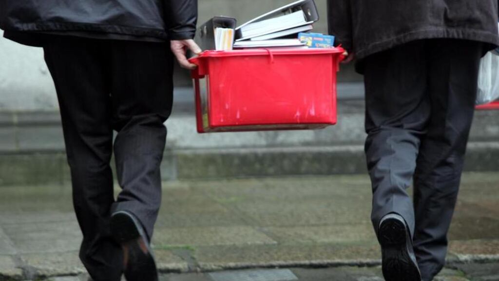 Legal documents are removed following the final day of the Mahon tribunal at Dublin Castle in October 2008. Photograph: Eric Luke