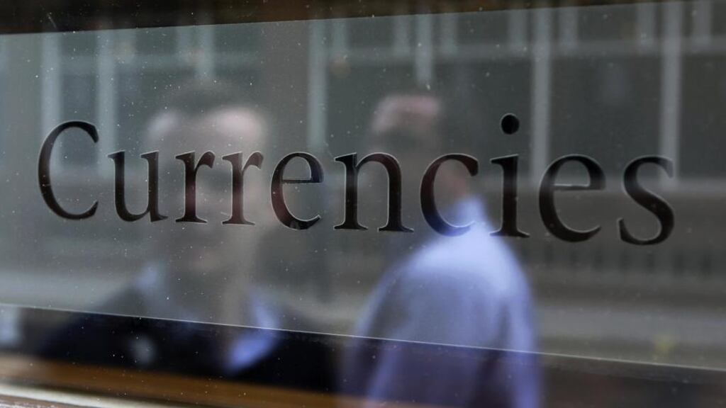 A widening probe of the foreign-exchange market is riling an industry already under pressure to reduce costs as computer platforms displace human traders. Photographer: Chris Ratcliffe/Bloomberg