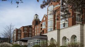 New owner of Four Seasons hotel beats estimates