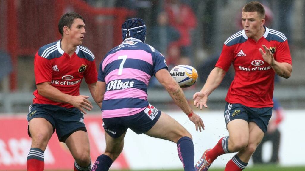 Andrew Conway (right) scored three tries in the first half of the game against Russia, while Ian Keatley (left) scored a try and kicked five conversions. Photograph: James Crombie/Inpho
