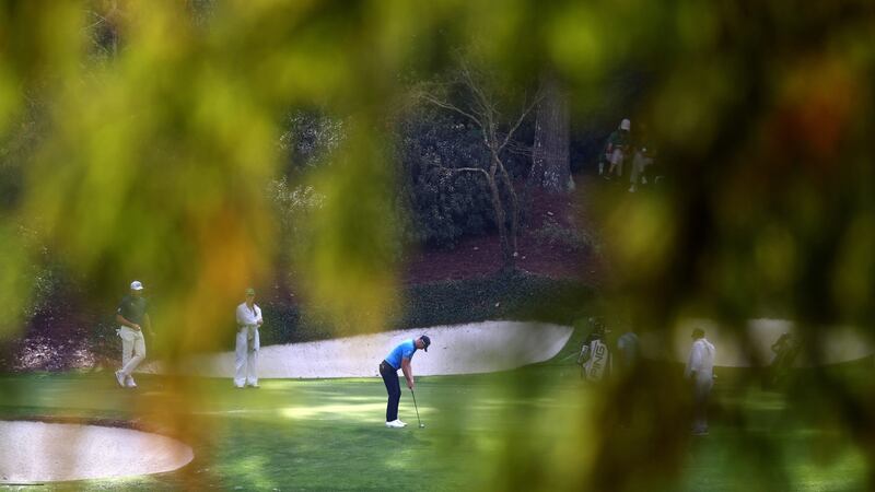 Matt Wallace putts on the 12th green during a practice round. Photo: Rob Carr/Getty Images