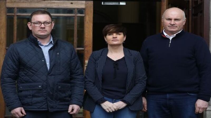 Micheal (left) Kathryn and Tom McGagh at the Four Courts yesterday where the action against the HSE was settled for €265,000. Photograph: Collins