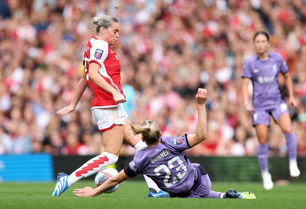 Arsenal's Alessia Russo and Liverpool's Gemma Bonner battle for the ball during the Barclays Women's Super League game at the Emirates Stadium, London. Photograph: Steven Paston/PA Wire