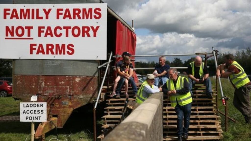 A file image of farmers protesting outside the Dawn Meats plant at Grannagh on the Waterford/ Kilkenny border. Photograph: PA.