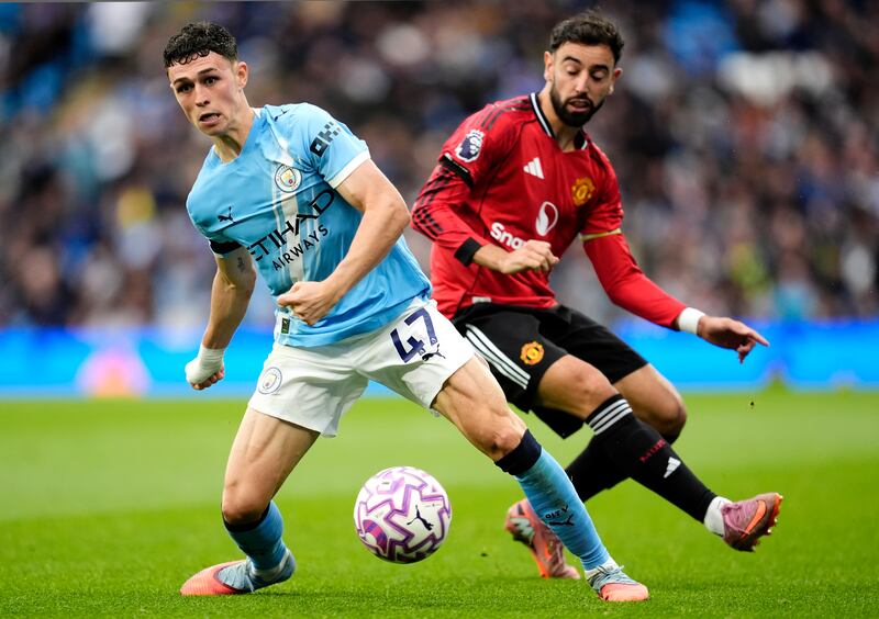 Manchester City's Phil Foden and Manchester United's Bruno Fernandes at Etihad Stadium on Sunday. Photograph: Nick Potts/PA Wire