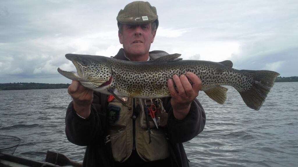 Mick Kelly with a magnificent trout from Lough Sheelin