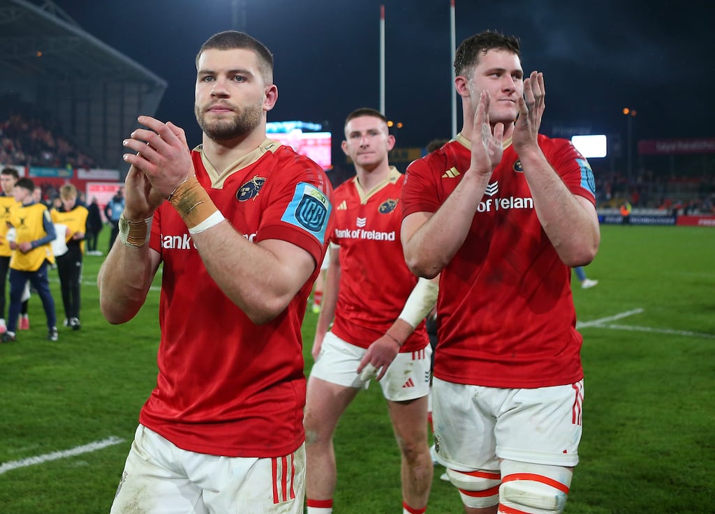 Munster's Diarmuid Kilgallen and Evan O'Connell applaud the supporters following the defeat to New Zealand XV at Thomond Park. Photograph: Ken Sutton/Inpho