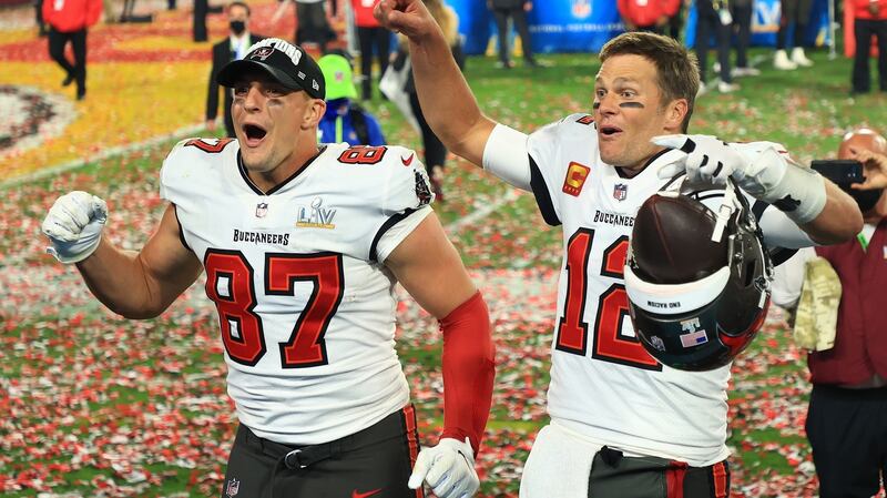 Rob Gronkowski and Tom Brady celebrate Tampa Bay Buccaneers’ Super Bowl victory over Kansas City Chiefs at the Raymond James Stadium in Tampa, Florida. Photograph: Mike Ehrmann/Getty Images