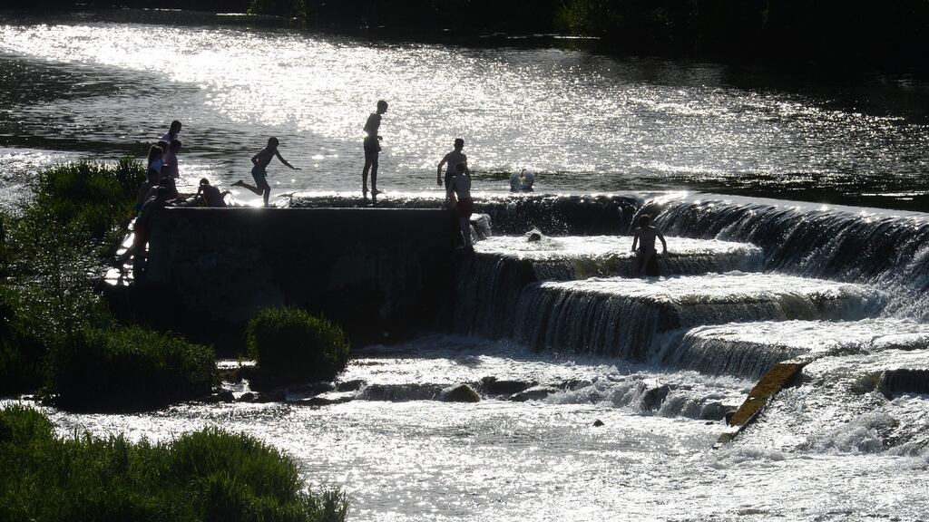 Swimmers playing in the Weir at Lucan during blazing sunshine. Photograph: Alan Betson / The Irish Times