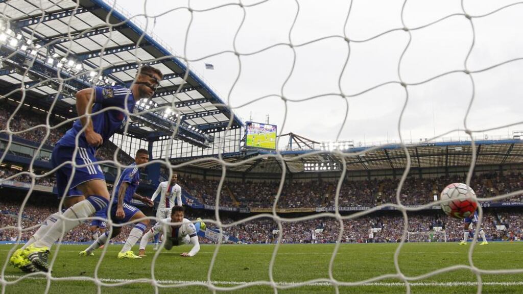 Crystal Palaces defender Joel Ward heads home the winning goal against Chelsea at Stamford Bridge. Photograph: Ian Kington/AFP
