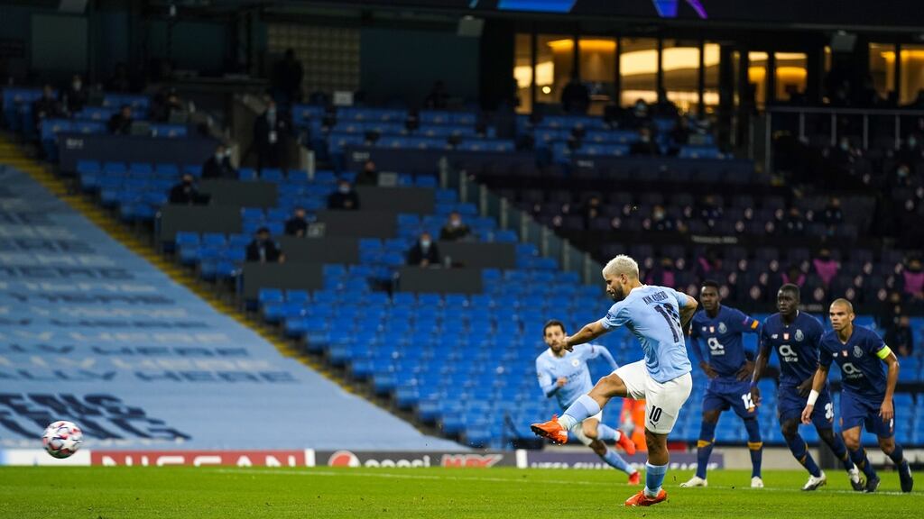 Sergio Agüero of Manchester City scores their first goal during the Champions League clash with Porto. Photo: Tim Keeton/EPA