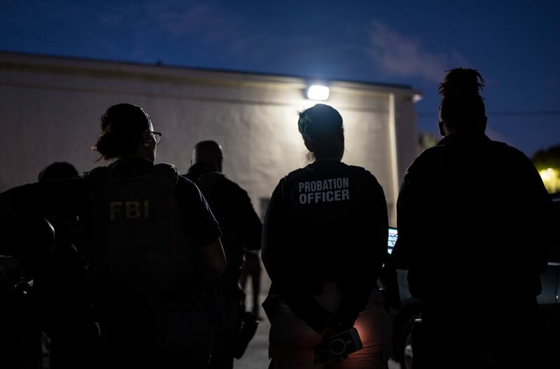 Members of Immigration and Customs Enforcement (Ice) and Enforcement and Removal Operations (Ero), assisted by the FBI and other federal agencies perform an arrest in Miami on May 28th. Photograph: Todd Heisler/The New York Times