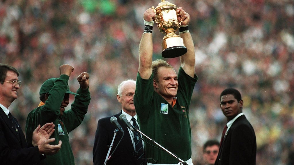 South African captain Francois Pienaar lifts the William Webb Ellis trophy after the victory over New Zealand in the 1995 Rugby World Cup Final. Photograph: Inpho