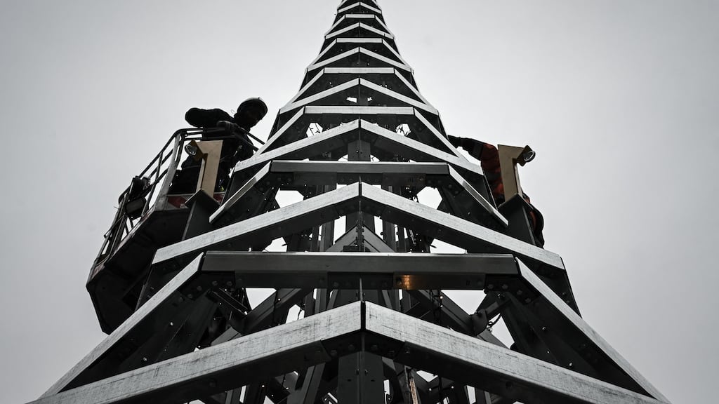 Rockin’ around the steel-and-glass Christmas tree in Bordeaux in France, where the mayor is not a fan of ‘dead trees’. Photograph: Philippe Lopez/AFP
