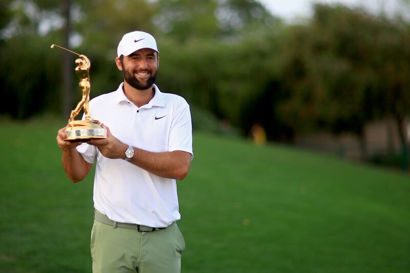 Scottie Scheffler of the United States poses with the trophy after winning The Players Championship at TPC Sawgrass on Sunday. Photograph: Mike Ehrmann/Getty Images