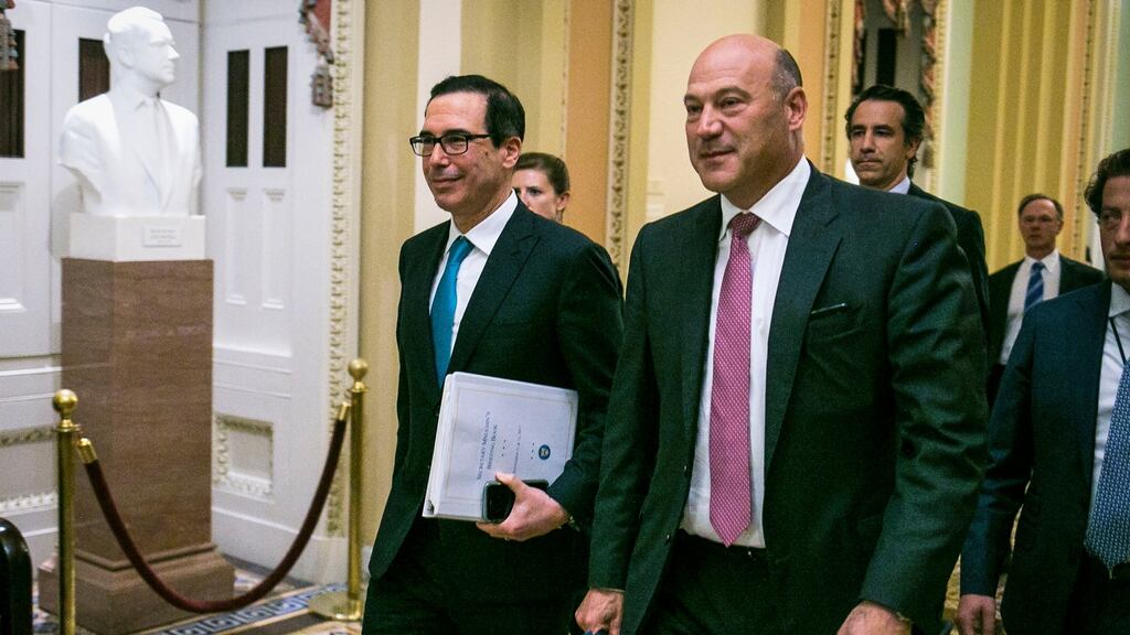 Treasury Secretary Steven Mnuchin and Gary Cohn, the chief White House economic adviser, on Capitol Hill, in Washington, September 12th, 2017. The Republican tax framework is built around a plan to slash corporate taxes, but party leaders now face a key question: Can they afford to make those cuts permanent? (Photograph: Al Drago/The New York Times)